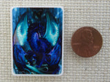 Second view of blue and green dragon needle minder.