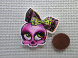 Second view of the Purple Skull with a Bow Needle Minder