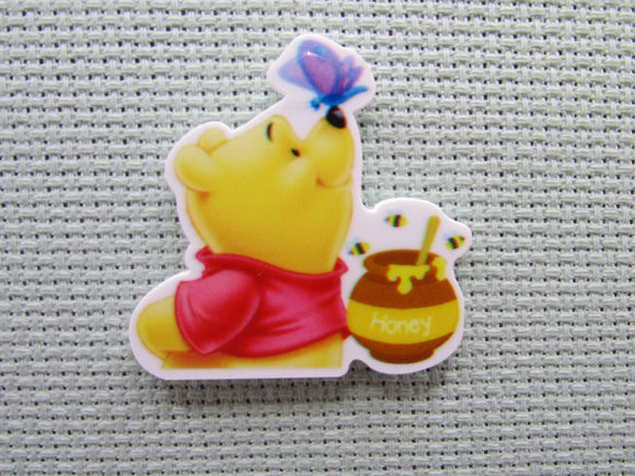 First view of the Pooh with a Pot of Honey and a Butterfly Needle Minder