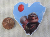Second view of Carl and Ellie in a Blue Heart Needle Minder.