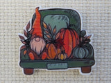 First view of gnome in the back of a green truck needle minder.