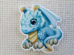 First view of Light Blue Baby Dragon Needle Minder.