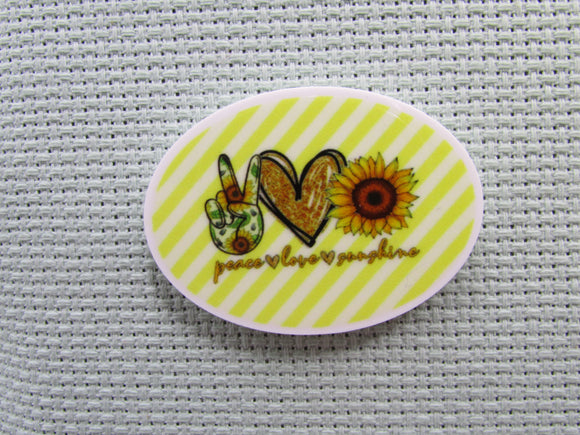 First view of the Peace Love Sunshine Needle Minder