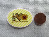 Second view of the Peace Love Sunshine Needle Minder