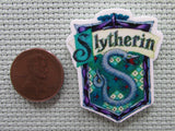 Second view of the Slytherin House Crest Needle Minder