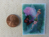 Second view of Tinker Bell with a Butterfly Needle Minder.