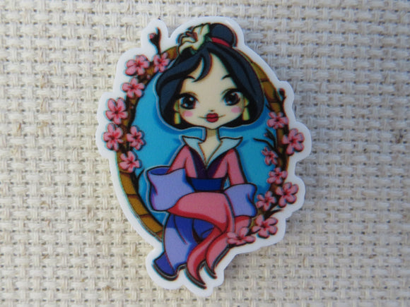 First view of Mulan in a Floral Frame Needle Minder.