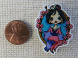 Second view of Mulan in a Floral Frame Needle Minder.