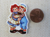 Second view of Raggedy Ann and Andy Hugging Needle Minder,.