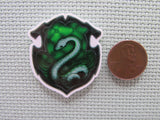 Second view of the Slytherin House Crest Needle Minder