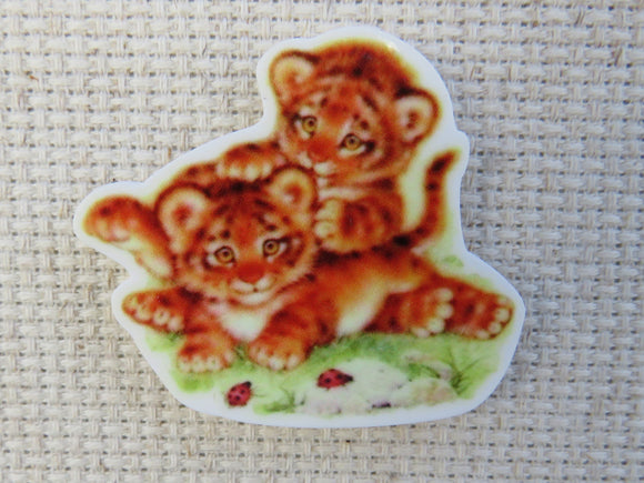 First view of Tiger Cubs Playing Needle Minder.