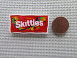 Second view of the Skittles Needle Minder