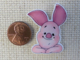 Second view of Smiling Piglet Needle Minder.