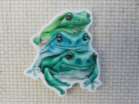 First view of A Stack of Frogs Needle Minder.