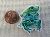 Second view of A Stack of Frogs Needle Minder,.