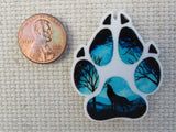 Second view of Wolf Scene in a Paw Print Needle Minder.