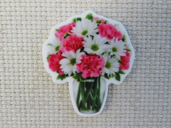 First view of White Daisies and Pink Carnations in a Vase Needle Minder.