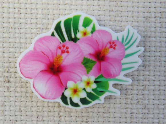 First view of Beautiful pink hibiscus flowers with white plumeria and green leaves minder,
