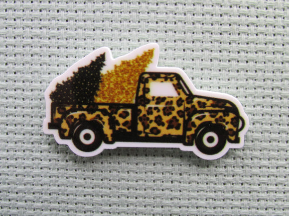 First view of the Animal Print Christmas Tree Carrying Truck Needle Minder