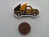 Second view of the Animal Print Christmas Tree Carrying Truck Needle Minder
