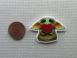 Second view of Alien Child with a Heart Needle Minder.