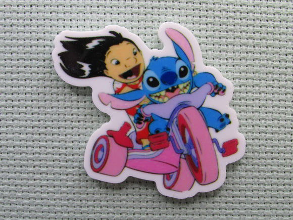 First view of the Lilo and Stitch Riding a Big Wheel Needle Minder