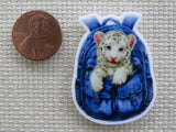 Second view of White Tiger in a Back Pack Needle Minder.