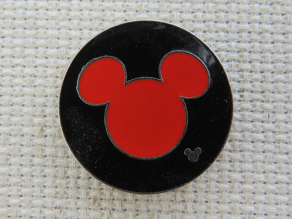First view of Red Mickey Head in a Black Disc Needle Minder.