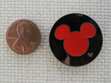 Second view of Red Mickey Head in a Black Disc Needle Minder.