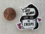 Second view of Snake Coiled Around a Tombstone with the Saying "I just Wanna Give You the Creeps" Needle Minder.