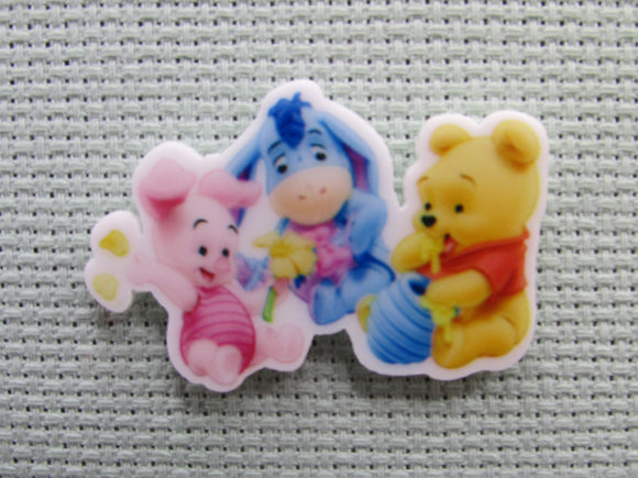 First view of the Childlike Pooh Eeyore and Piglet Having Fun Needle Minder