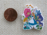 Second view of Alice Walking Amongst the Flowers Needle Minder.