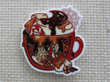 First view of Christmas Chocolate Teacup Needle Minder.