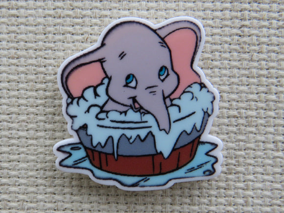 First view of Baby Dumbo in a Wash Tub Needle Minder.