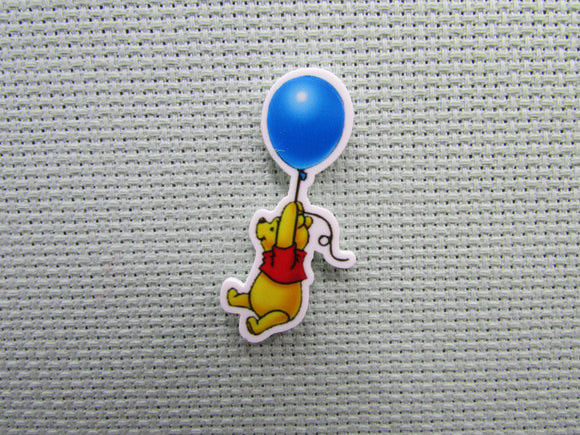 First view of the Pooh Floating with a Blue Balloon Needle Minder