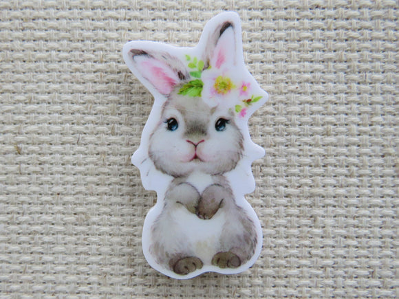 First view of cute grey bunny needle minder.