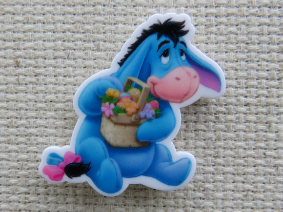 First view of Eeyore with a Basket of Flowers Needle Minder.