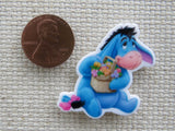 Second view of Eeyore with a Basket of Flowers Needle Minder.