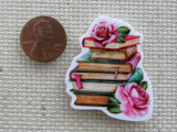 Second view of A Pile of Six Books with Pink Roses Needle Minder.