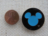 Second view of Blue Mickey Head in a Black Disc Needle Minder.