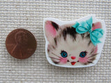 Second view of Kitten Face with a Blue Bow Needle Minder.