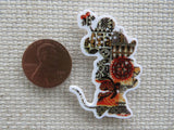 Second view of Brown, Black and Auburn colored Minnie Mouse Needle Minder.