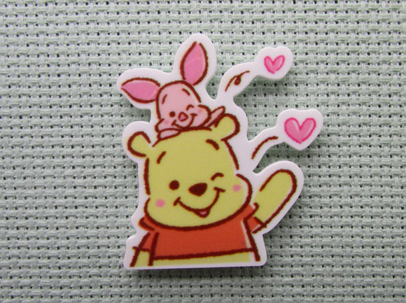 First view of the Pooh and Piglet Blowing Kisses Needle Minder