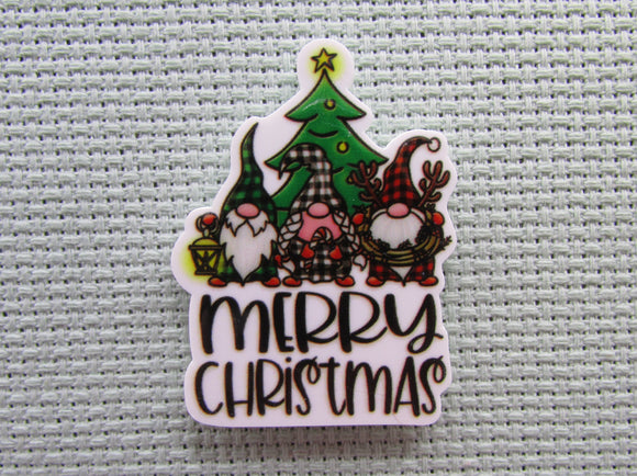 First view of the Merry Christmas Gnome Trio in Front of a Christmas Tree Needle Minder