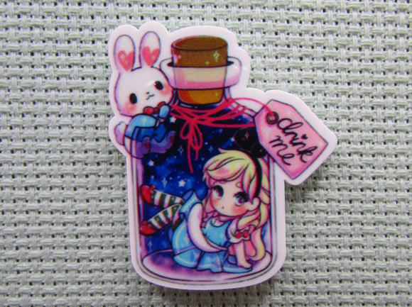 First view of the Alice in a Drink Me Bottle with the White Rabbit Looking on Needle Minder