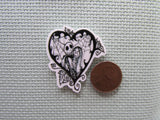 Second view of the Black and White Jack and Sally Spiderweb Heart Needle Minder
