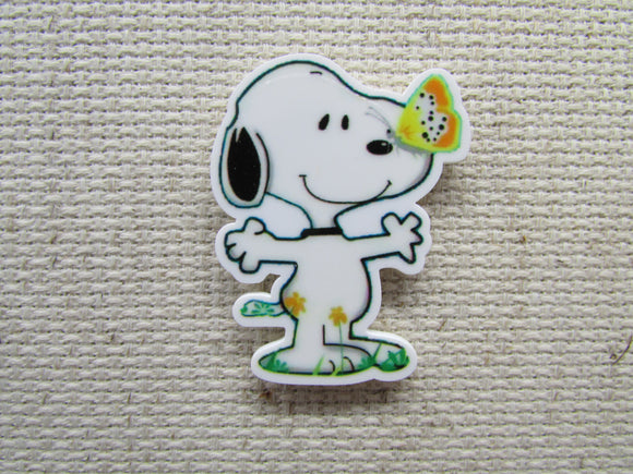 First view of the Snoopy with a Butterfly on his Nose Needle Minder