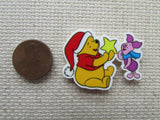 Second view of the Pooh and Piglet with a Christmas Star Needle Minder