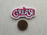 Second view of the Grease Car Needle Minder