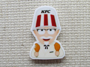 First view of the The Colonel Fried Chicken Needle Minder